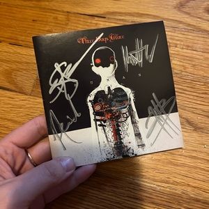 Three Days Grace SIGNED human race CD book.